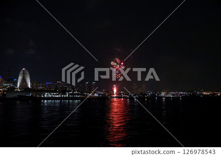 Fireworks display over Yokohama Port during a lively festival celebration at night Fireworks display over Yokohama Port during a lively festival celebration at night 126978543
