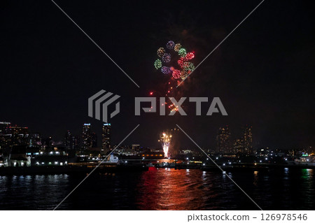 Fireworks display over Yokohama Port during a lively festival celebration at night Fireworks display over Yokohama Port during a lively festival celebration at night 126978546