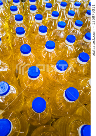 stack of bottles with sunflower seed oil stack of bottles with sunflower seed oil 126979011