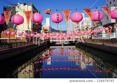 Lantern reflected on water surface 126979745