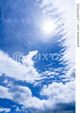 Sun, blue sky and fantastic clouds right 126979829