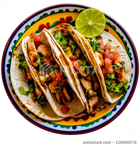 Fresh Grilled Chicken Tacos with Salsa and Lime on Rustic Colorful Plate 126980576