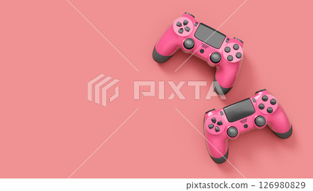 Realistic red video game joysticks or gamepads on pink background 126980829