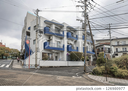 March 28 2025 Modern Residential Building on a Quiet Urban Street 126980977