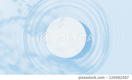 A white cylindrical pedestal floating on the water surface. Ripples. Shadows of leaves. Aerial view. 3D (landscape) 126982087