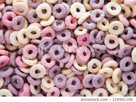 Macro shot of fruit circles cereal breakfast textured background with blueberry,banana Macro shot of fruit circles cereal breakfast textured background with blueberry,banana 126982106