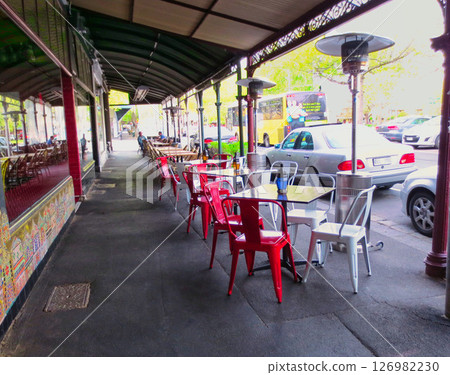 Cafe table lined up on the sidewalk Melbourne, Australia 126982230