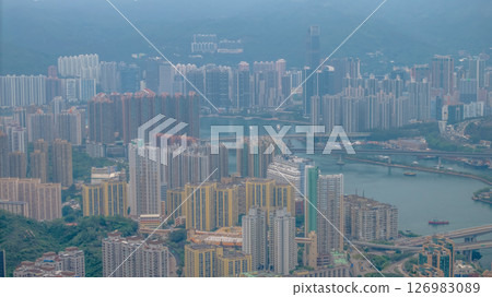 May 25 2025 Hong Kong Apartments and Industrial Port in Urban Setting 126983089