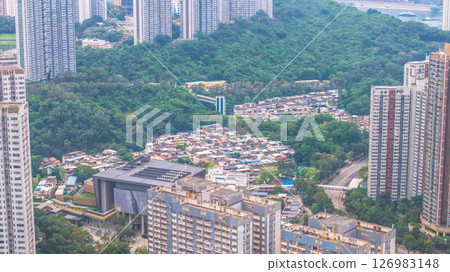 May 25 2025 Residential Area Surrounded by Lush Green Forest and Skyscrapers 126983148