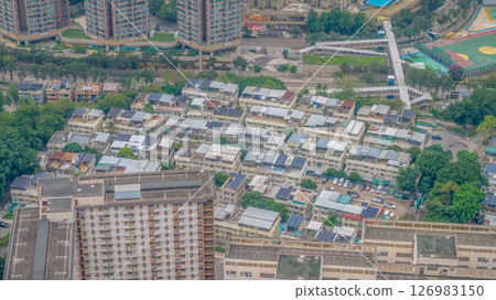 May 25 2025 Residential Area Surrounded by Lush Green Forest and Skyscrapers 126983150