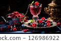 Refreshing Raspberry Juice in Elegant Crystal Goblet 126986922
