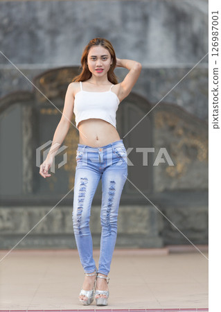 young woman in casual clothes young woman in casual clothes 126987001