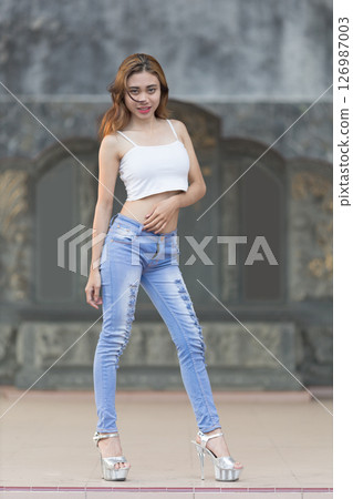 young woman in casual clothes young woman in casual clothes 126987003
