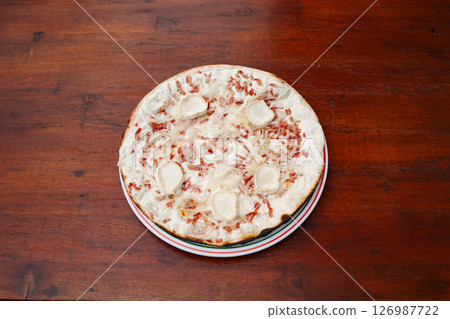 bacon munster cheese and cream tarte flamee. Delicious freshly prepared meal, perfect for menus, restaurants, or food delivery concepts. bacon munster cheese and cream tarte flamee. Delicious freshly prepared meal, perfect for menus, restaurants, or food delivery concepts. 126987722