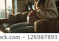 Close-up of a pregnant woman's big belly. 126987893