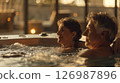 Man and woman in a jacuzzi. 126987896