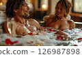 A couple in love spends time in a jacuzzi. 126987898