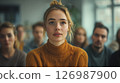 Beautiful blonde girl at a meeting in the office. 126987900