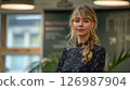 Blonde woman in the office. 126987904