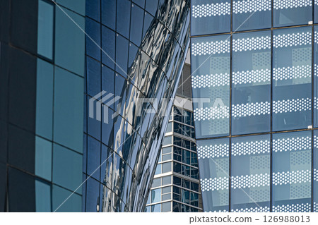 Different glass walls of buildings. Architecture details. Abstract background 126988013
