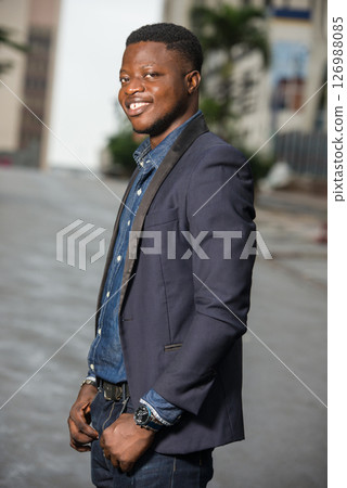 Only confident and handsome businessman in suit outside 126988085