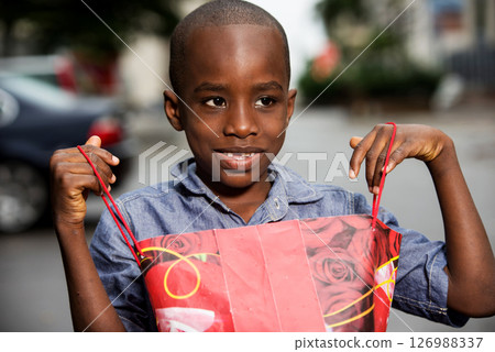 close-up of little boy, smiling. 126988337