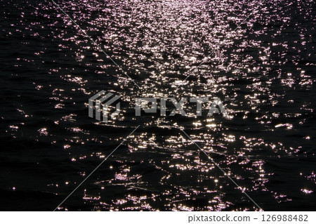 Sunlight reflecting off the sea Sunlight reflecting off the sea 126988482