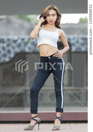 young woman in casual clothes young woman in casual clothes 126988652