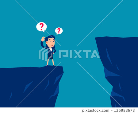 Confusion. Businessman standing on the edge of ravine thinking before making a decision 126988678