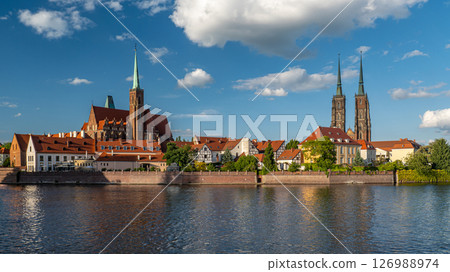 Stunning view of Collegiate Church of the Holy Cross, St Bartholomew under blue sky, Wroclaw, Poland 126988974