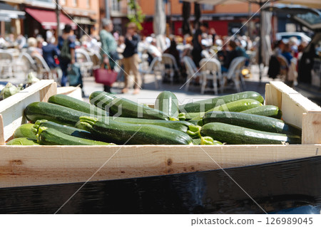 crate with zucchinis for sale at farmers market crate with zucchinis for sale at farmers market 126989045