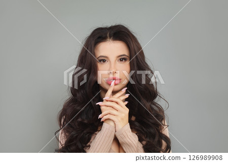 Cute model woman posing on gray background, fashion portrait 126989908