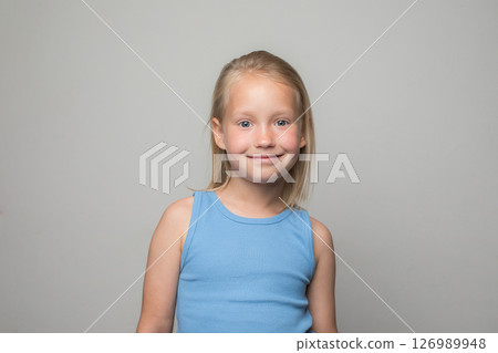 Happy smiling little girl child. Happy and beauty kid on white background, child 6 years old 126989948