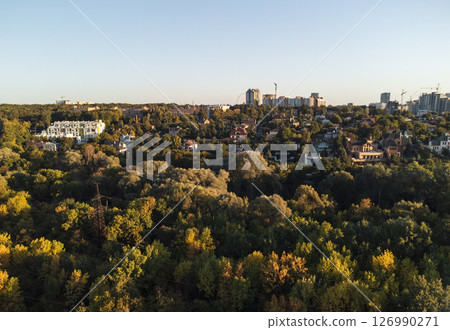 Sunny Green Park with Cityscape from Drone Sunny Green Park with Cityscape from Drone 126990271