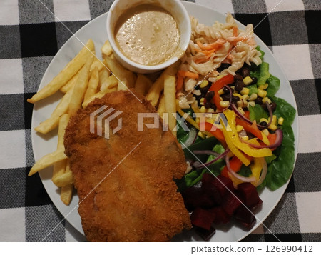 Crumbed Pork at the bar of Carmila Hotel, Australia 126990412