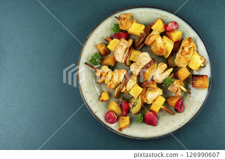 Grilled chicken on bamboo skewers. Grilled chicken on bamboo skewers. 126990607