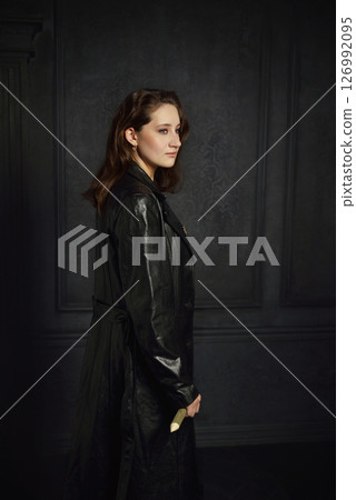 A young girl with dark hair poses as Buffy the vampire hunter 126992095