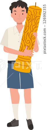 thai schoolboy holding large wax candle for buddhist holiday celebration in thailand cultural festival and asian tradition. thai schoolboy holding large wax candle for buddhist holiday celebration in thailand cultural festival and asian tradition. 126992355