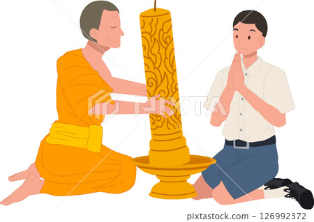A young Thai student offers a candle to a monk during Khao Phansa at a temple 126992372