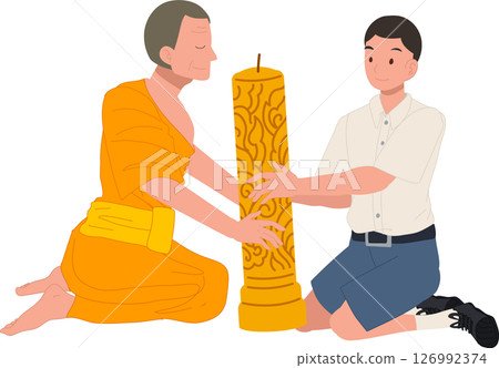 A young Thai student offers a candle to a monk during Khao Phansa at a temple 126992374