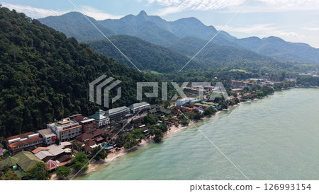 Tropical beach meeting lush rainforest in koh chang, thailand 126993154