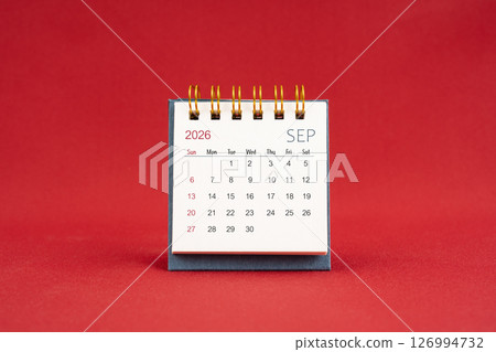 September Mini calendar for 2026 year on red background. September Mini calendar for 2026 year on red background. 126994732