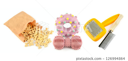 Pet accessories concept. Dry food, toys and combs for pet on isolated white background. Collage. 126994864