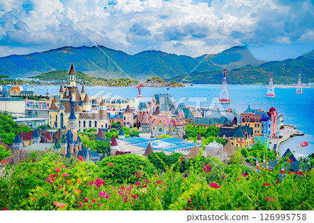 An island with an amusement park. 126995758