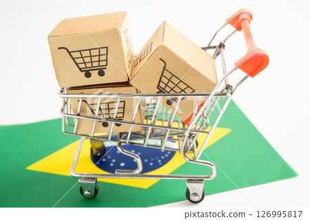 Brazil shopping, Shopping cart box on Venezuala flag, import export, finance commerce. 126995817