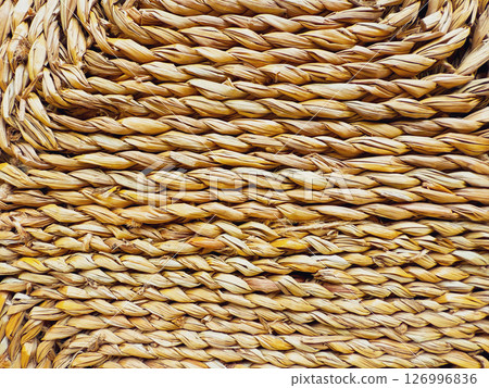 A fragment of a woven straw texture. Abstract background 126996836