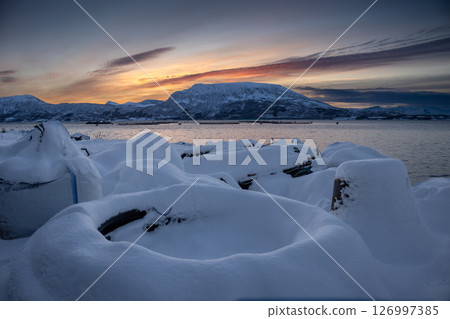 Industrial place with snow during sunset, Norway 126997385