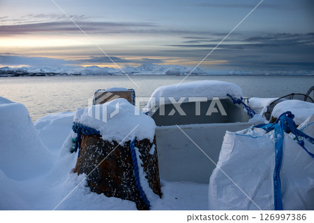 Industrial place with snow during sunset, Norway Industrial place with snow during sunset, Norway 126997386
