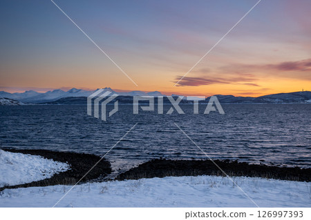 Snowy  mountains and sea in the sunset, Norway 126997393