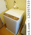 Washing machine in the bathroom, vertical washing machine 126997439